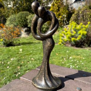 Bronze abstract lovers sculpture modern romantic couple embracing in smooth brown bronze suitable for indoor shelf or garden plinth display