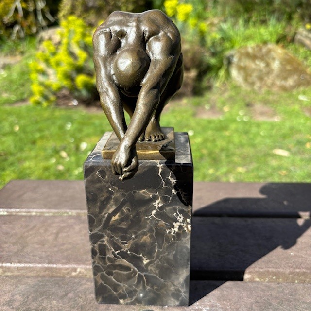 Bronze male swimmer diving sculpture on marble base trophy figure front view