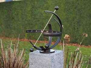 Bronze armillary sphere sundial Helios sculpture 47cm wide on garden pedestal