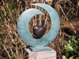 Jenny Wren Modern Abstract Bird Bronze Sculpture with stunning verdigris surround and brown patina.
