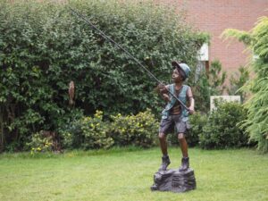 Boy Standing On Rock Fishing Fountain Water Feature Bronze Sculpture 1 | Avant Garden Bronzes