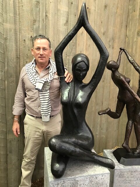 Jennifer modern abstract bronze woman sculpture kneeling with raised arms contemporary garden statue
