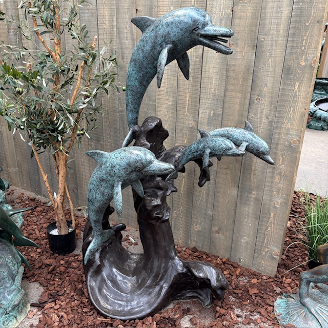 Large bronze dolphin pod water feature sculpture four dolphins fountain for swimming pool or coastal garden centrepiece