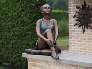 Bronze ballerina girl seated ballet dancer sculpture