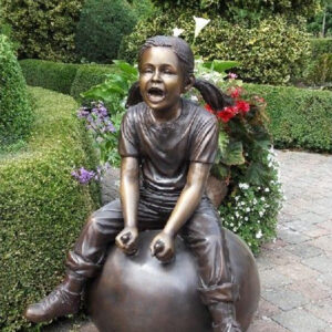 Little Girl Playing On Space Hopper Bouncy Ball Bronze Sculpture FIGI 71 1 | Avant Garden Bronzes