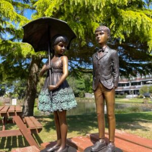 April Showers & Suited Boy Bronze Sculptures 1 | Avant Garden Bronzes