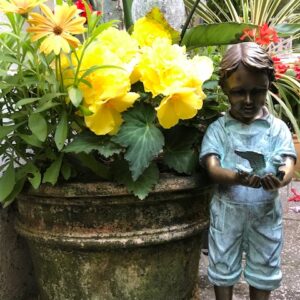 Boy Holding Bird Bronze Sculpture 4 | Avant Garden Bronzes
