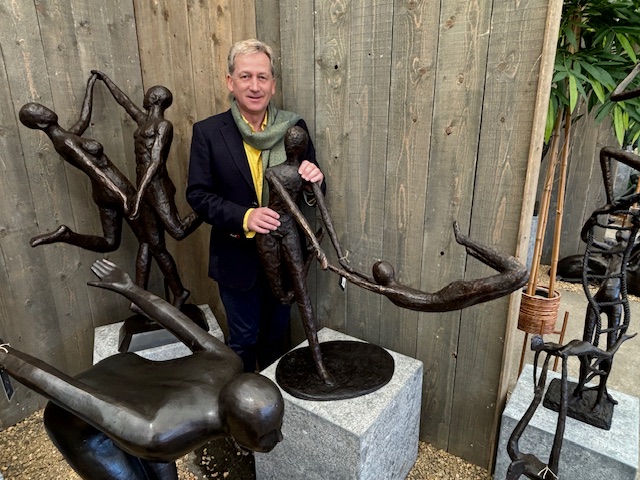 Father and son playful abstract bronze sculpture in deep grey patina