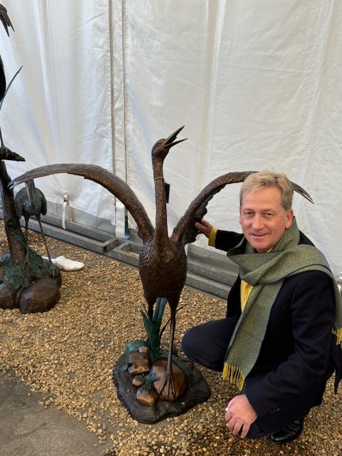 Dancing exotic bronze crane fountain sculpture with spreading wings