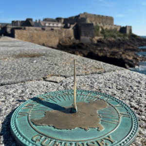 26cm solid bronze flat sundial with Roman numerals and verdigris finish designed for pedestal or stone garden placement