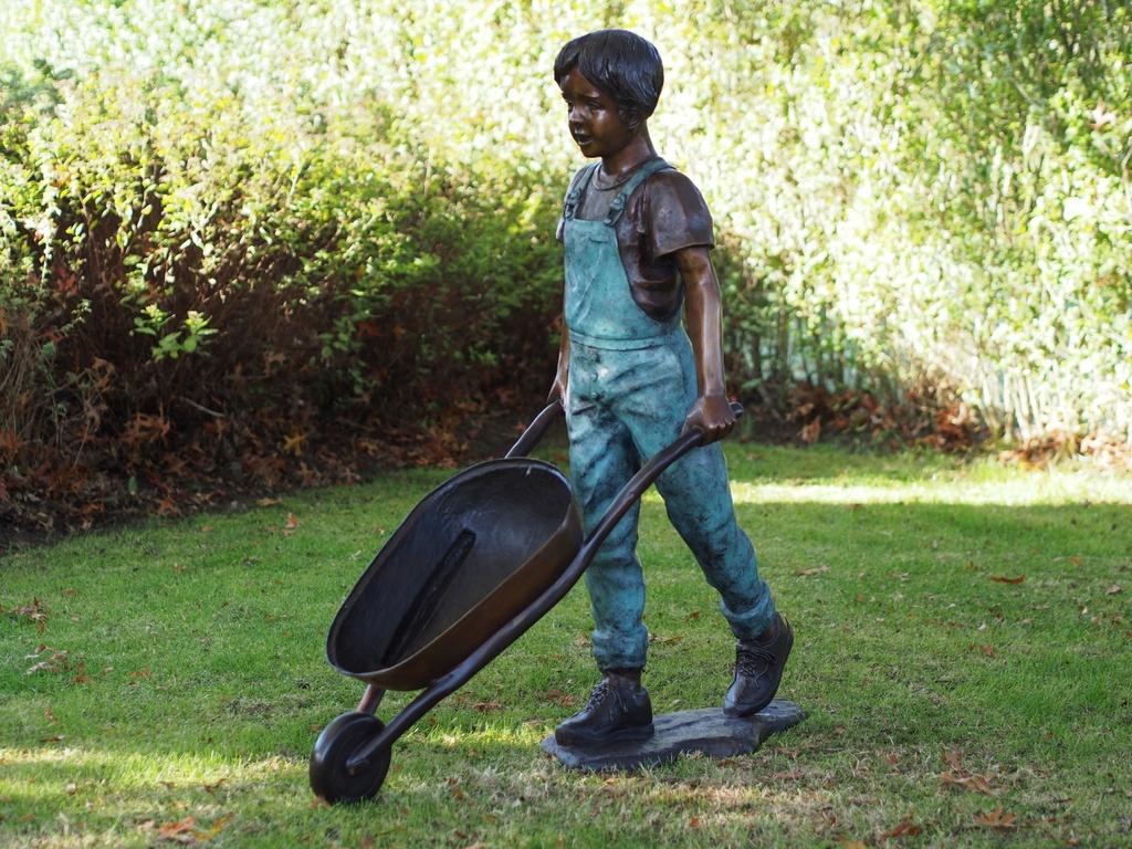 Bronze Boy Pushing Wheelbarrow In Verdigris Dungarees Garden Sculpture FIBO 67 | Avant Garden Bronzes