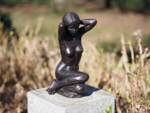 Seated bronze lady sculpture Mire nude female garden ornament