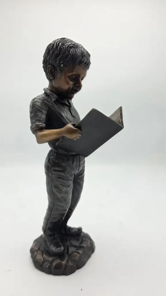 Bronze Pages Of Youth Young Boy Reading Book Garden Sculpture FIBO 64 | Avant Garden Bronzes