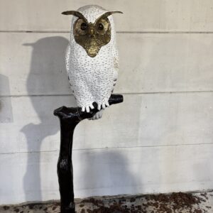 Bronze Snowy Owl On Tree Sculpture BI 104 positioned indoors with natural setting detail, emphasising presence and vertical impact