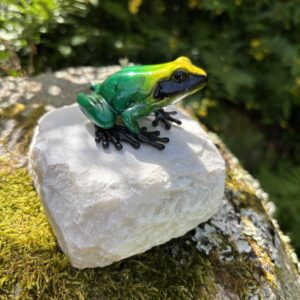 Bronze Emerald Green Rainforest Frog Sculpture MI 78 perched on a natural white stone with vibrant tropical colouring and glossy finish.