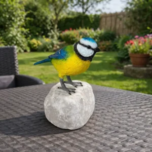 Small Sapphire Blue Tit Bird Bronze Sculpture BI 114 perched on natural stone base with striking blue, yellow and white colouring