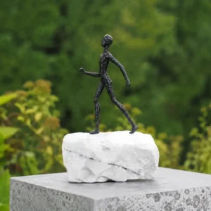 Keep Going Figure on Marble Base MO 74 contemporary bronze walking sculpture